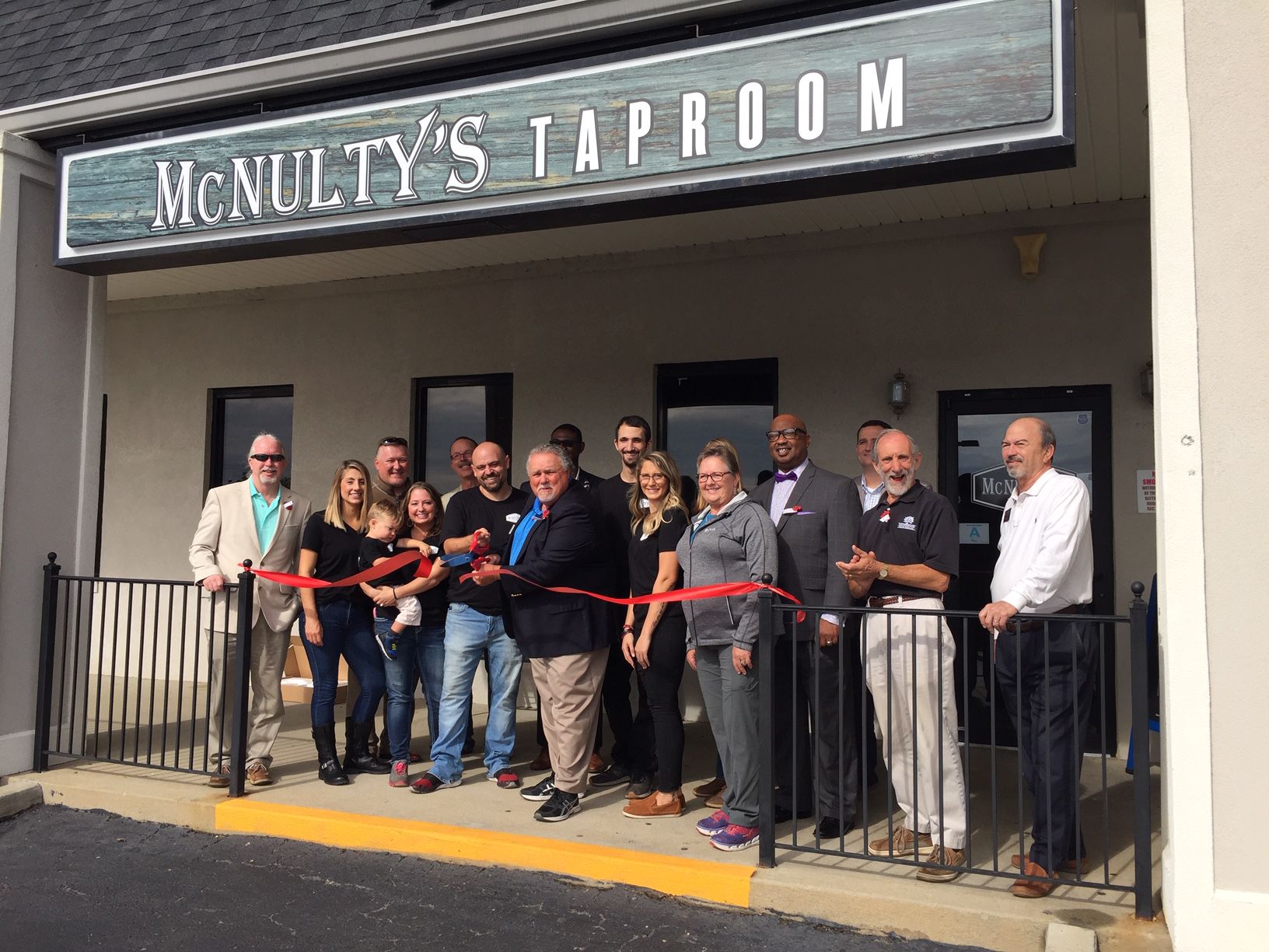 Ribbon-cutting opening at McNulty's Taproom.jpg